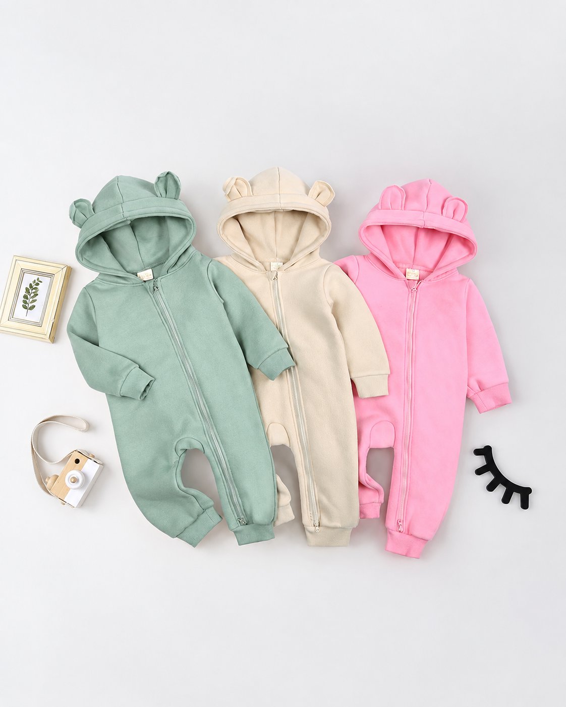 Sage green, ivory and pink baby rompers with bear-ear hoods