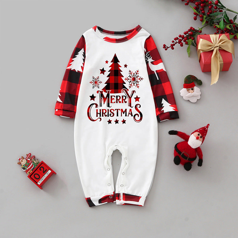 Infant baby one-piece Christmas pajama romper with bottom snap closure, red buffalo plaid raglan sleeves, and a Merry Christmas tree chest graphic.