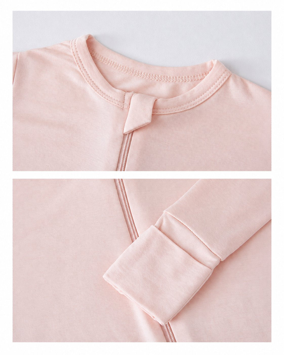 Neckline zipper guard and extended cuff details of a blush pink baby romper