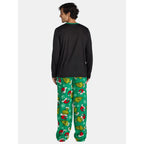Back view of a black long-sleeve pajama top and green Grinch-print pants on a man