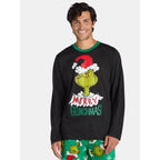 Front view of a man wearing a black Grinch Santa-hat top and green printed Christmas pajama pants