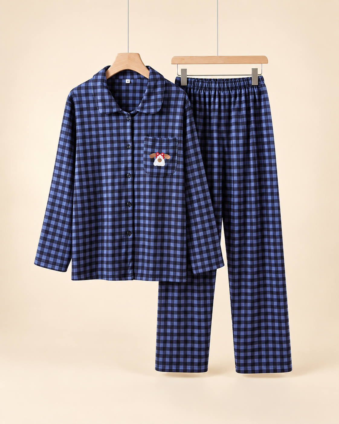 Women's blue plaid pajama set with rounded collar and embroidered dog chest pocket