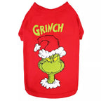 Red dog shirt with yellow Grinch lettering and a green Grinch face wearing a Santa hat