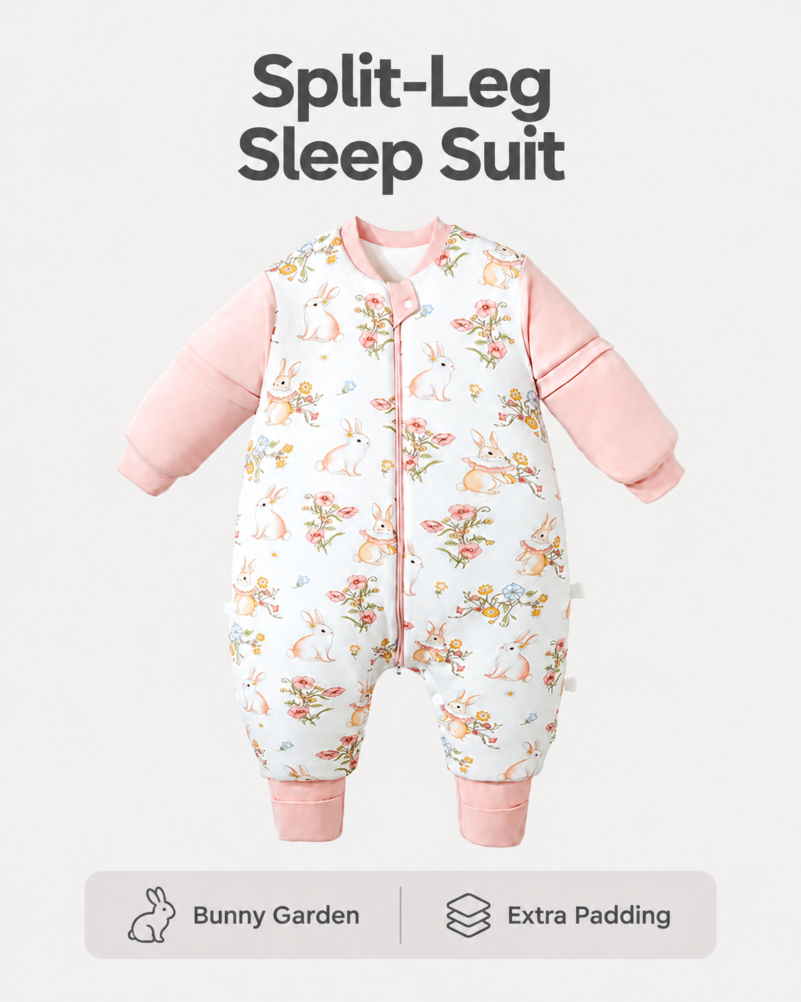 Extra Padding split-leg sleep suit in Bunny Garden print with pink sleeves and cuffs, rabbits and flowers, and a front zipper