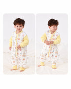 Toddler wearing the yellow Carnival split-leg sleep suit, showing front and back views