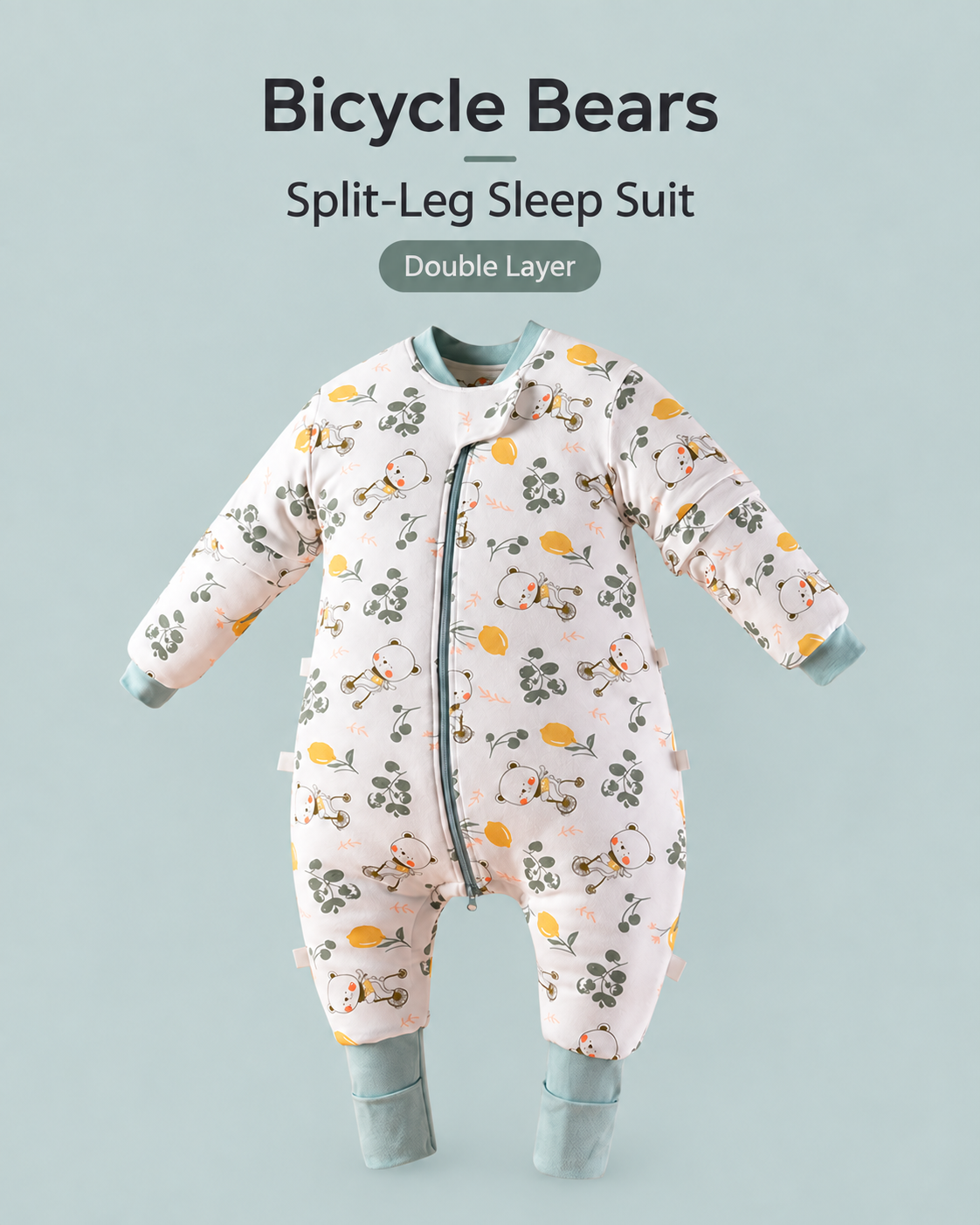 Double Layer split-leg baby sleep suit in Bicycle Bears print featuring bears riding bicycles, green leaves and yellow flowers with sage cuffs, a front zipper and detachable sleeves