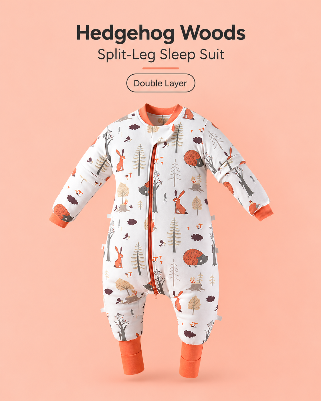 Double Layer split-leg baby sleep suit in Hedgehog Woods print featuring hedgehogs, rabbits and woodland trees with orange cuffs, a front zipper and detachable sleeves