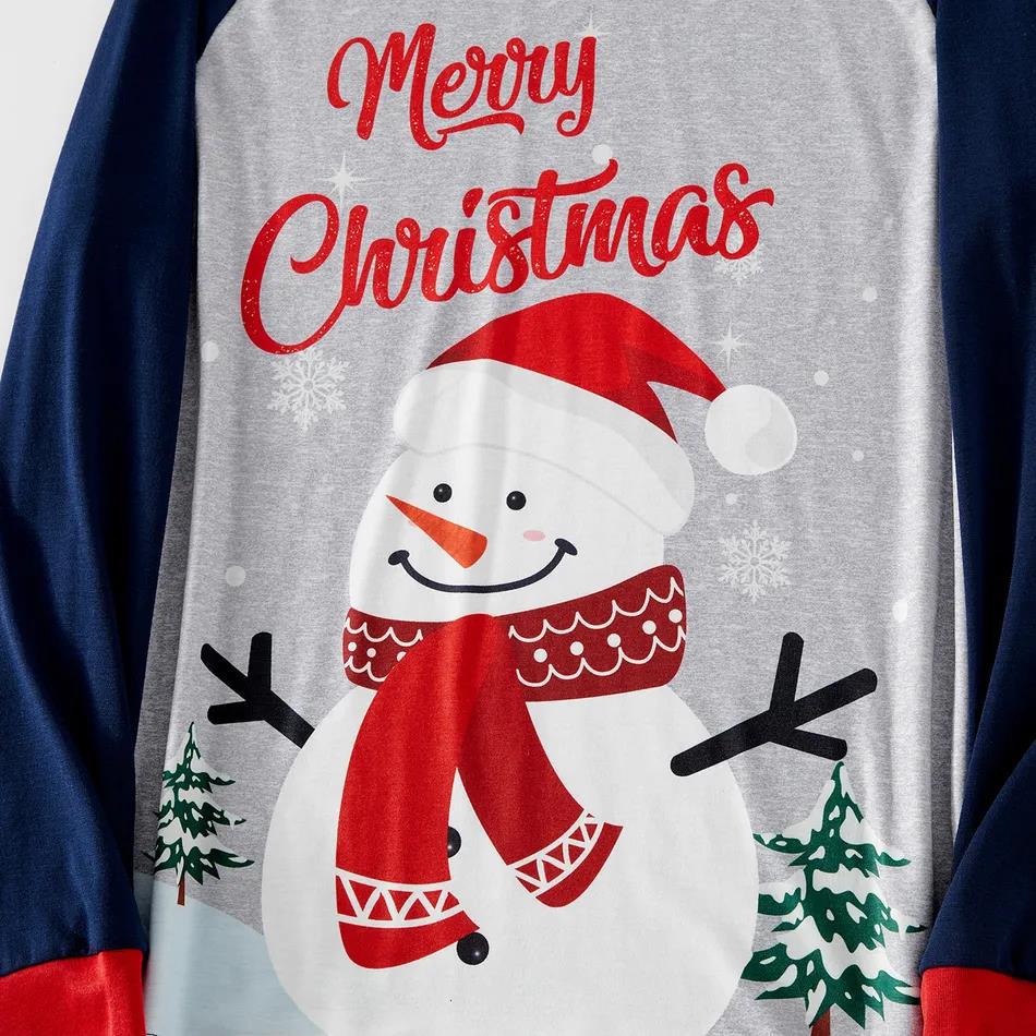 Merry Christmas snowman graphic on gray and navy pajama top, close-up