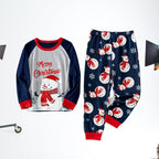 Women's matching snowman Christmas pajamas with long-sleeve top and navy pants