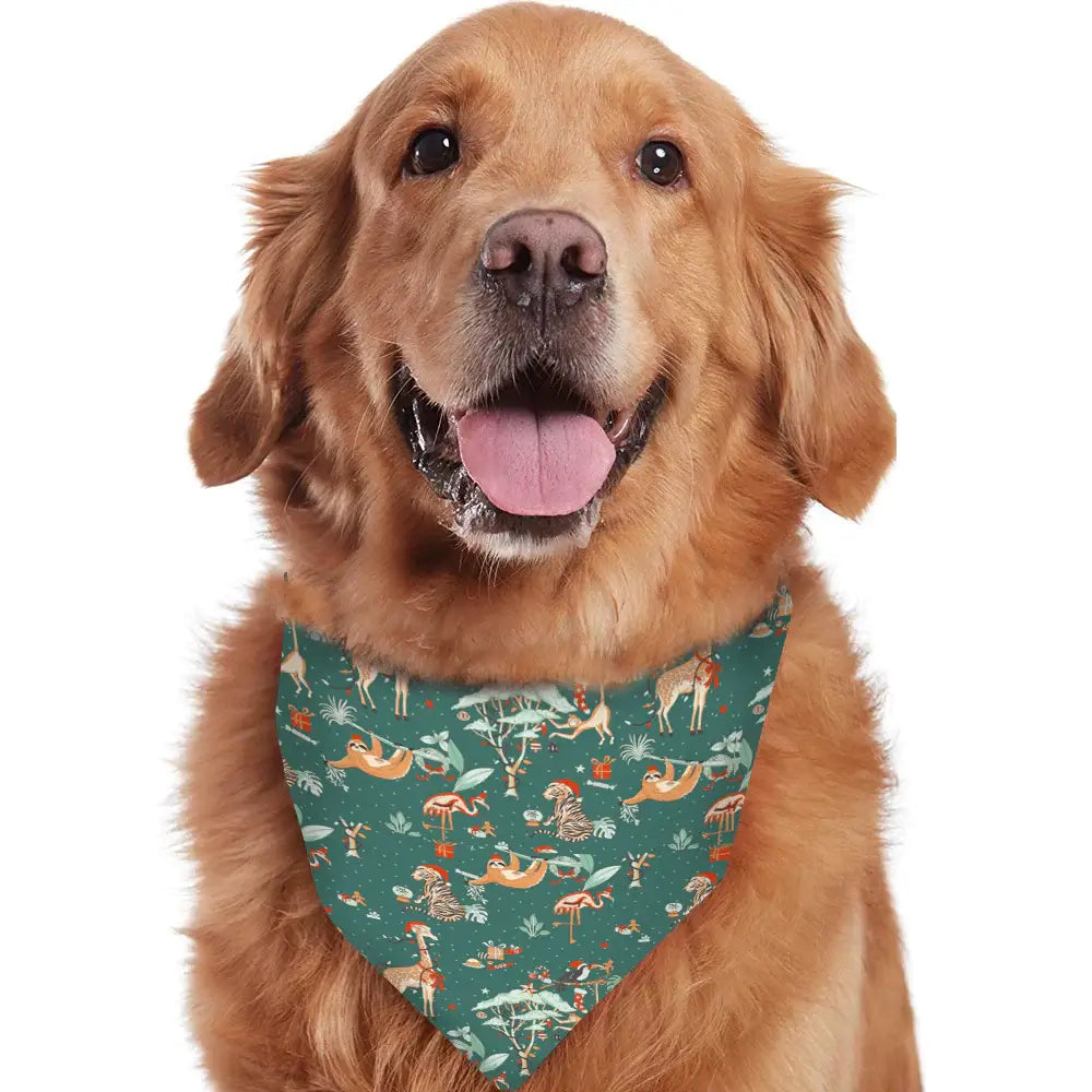 Golden retriever dog wearing a dark green holiday bandana featuring Christmas safari animal print on a white background.