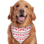 Golden retriever dog wearing a matching red and white Fair Isle reindeer holiday triangle bandana around its neck.