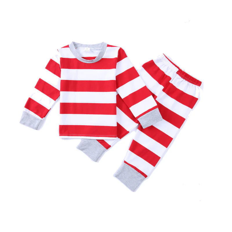 Kids two-piece Christmas pajama set in red and white horizontal stripes with grey ribbed neckline and cuffs, flat lay on a plain white background.