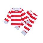 Kids two-piece Christmas pajama set in red and white horizontal stripes with grey ribbed neckline and cuffs, flat lay on a plain white background.