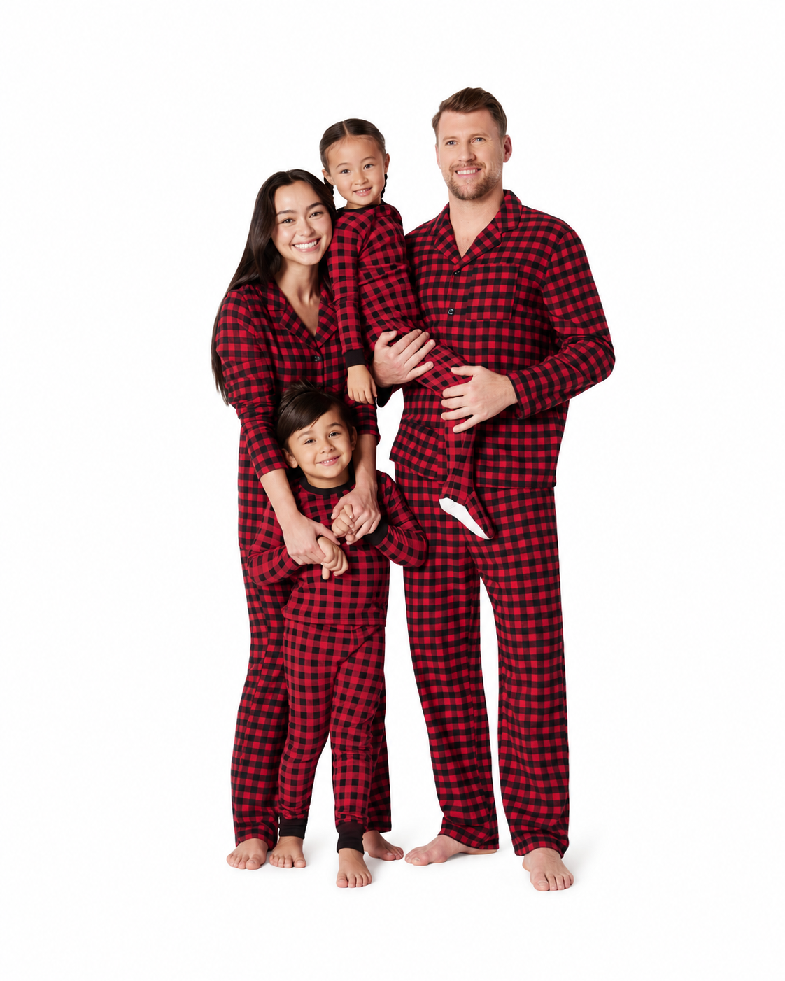 Family wearing red and black check matching Christmas pajamas.