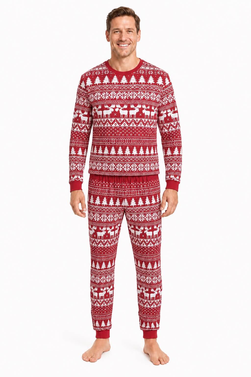 Man wearing red Fair Isle Christmas pajamas with white trees, reindeer and snowflake patterns.