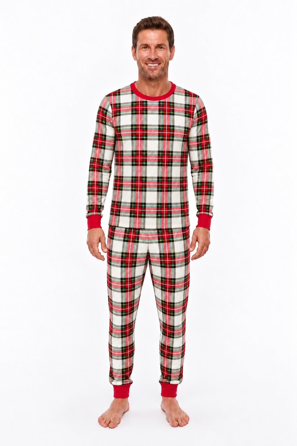 Woman modeling red, white and black plaid Christmas pajamas with a crewneck top and red ankle cuffs.
