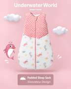 Pink sleeveless padded baby sleep sack with a raised-dot upper panel, whales, seahorses and sea-life print, and a front zipper