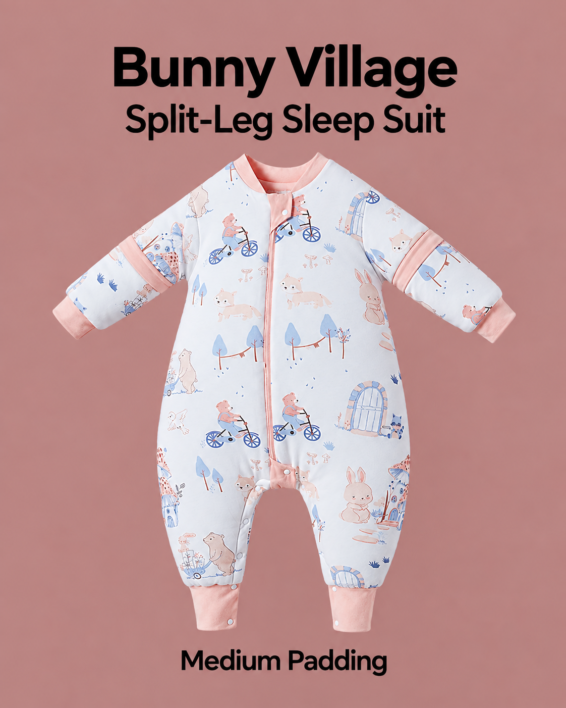 Medium Padding split-leg sleep suit in Bunny Village print with peach trim, rabbits, bicycles and village scenes, detachable sleeves and a front zipper