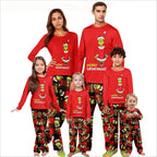 Family models wearing red Grinch pajama sets and a matching plaid baby romper on a white background