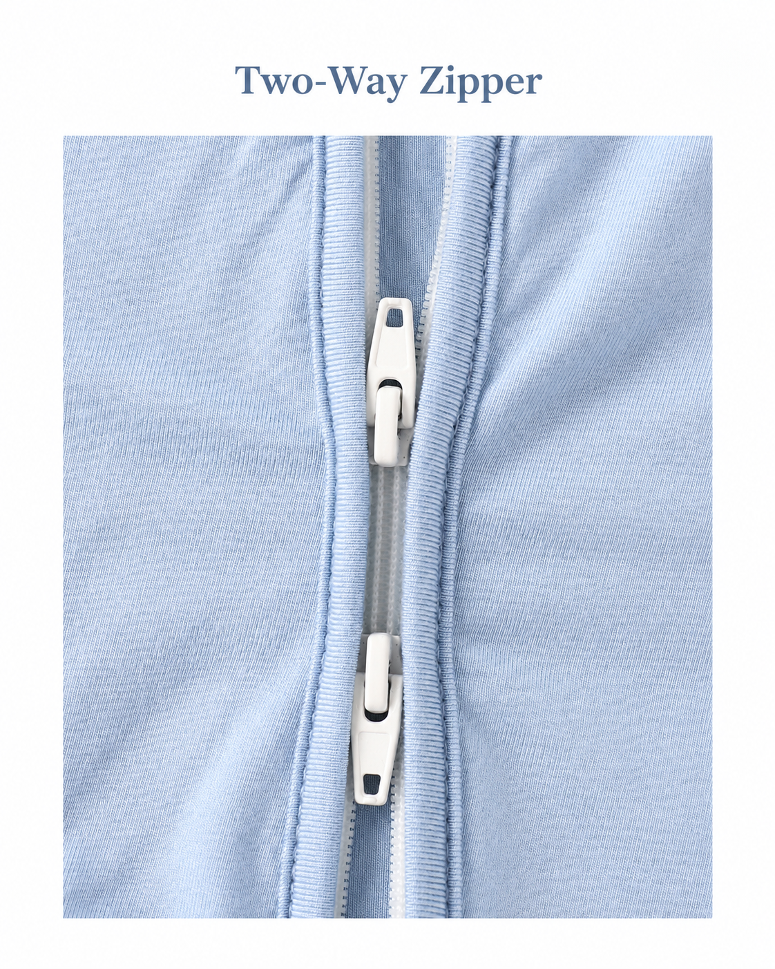 Close-up of the two-way zipper on the sky blue baby romper