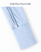 Fold-over foot cuff and lower zipper detail on the sky blue baby romper