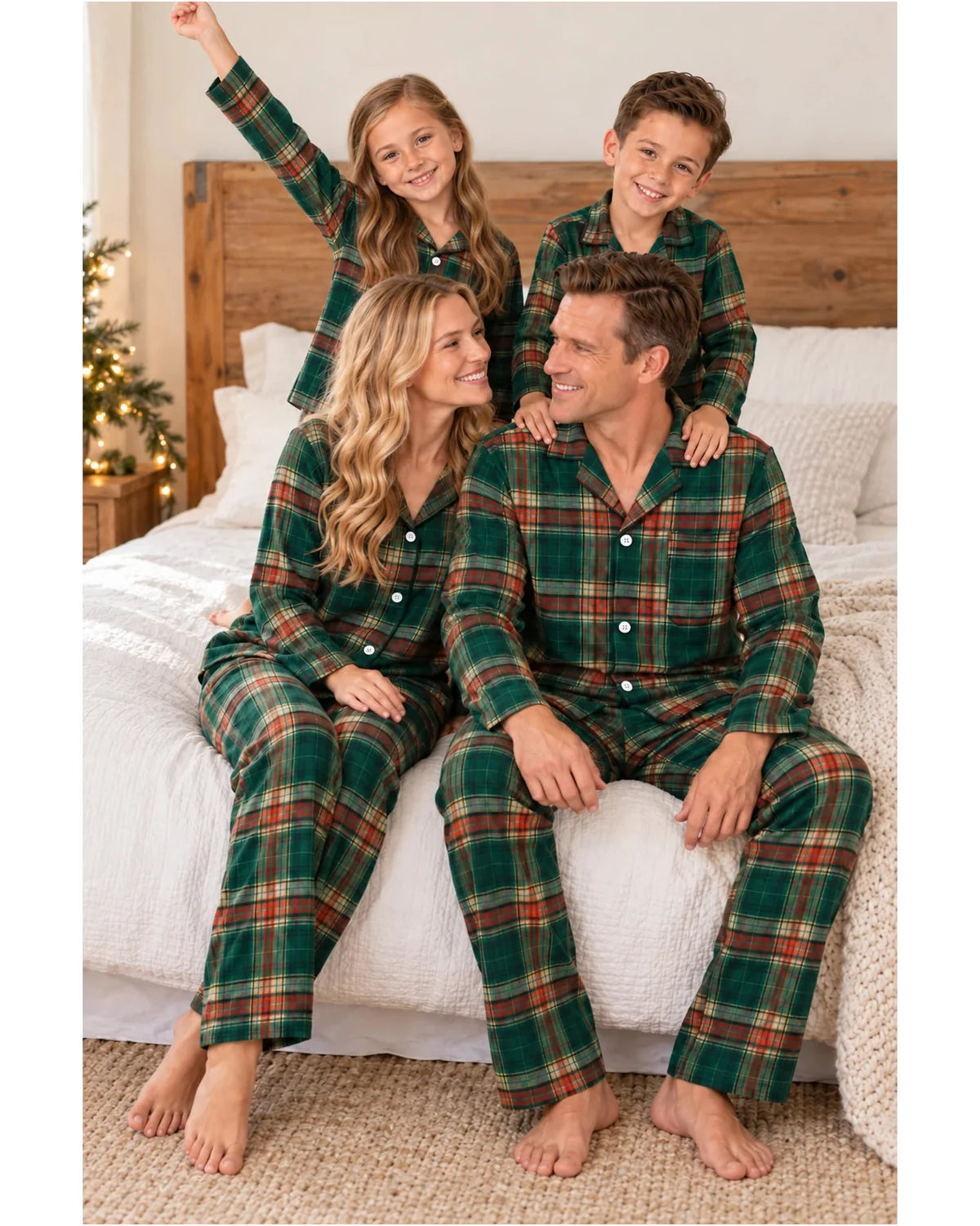 Family in light green tartan pajamas posing with the children standing behind the seated parents.