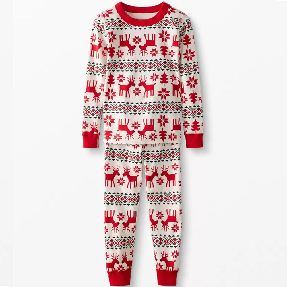Product shot on white background of a two-piece long-sleeve Fair Isle reindeer pajama set with red crew neck and ribbed cuffs.
