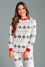 Women's two-piece white Christmas pajama set with red Fair Isle snowflake pattern and cuffed sleeves.