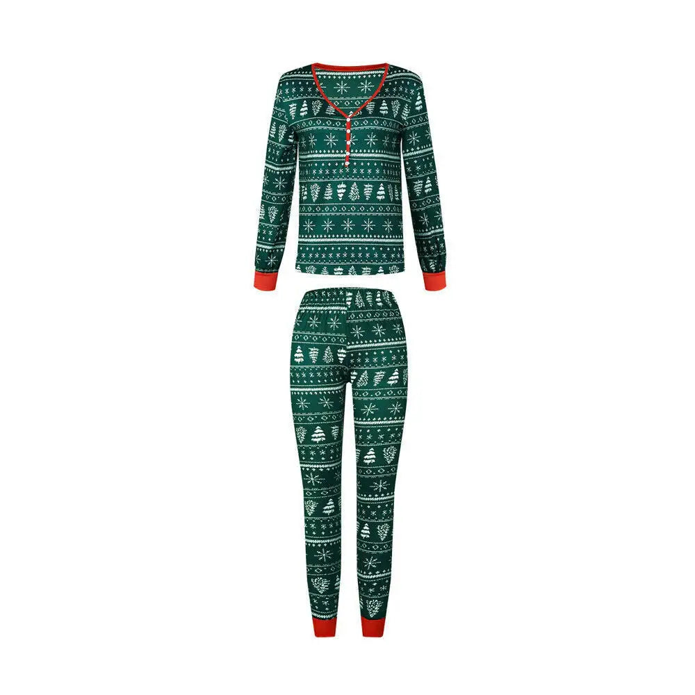 Product shot on white background of a women's dark green Fair Isle pajama set featuring a buttoned V-neck Henley top and slim-fit pants with red trim.
